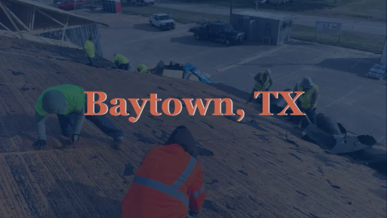 This image shows a professional roofer in Baytown, TX removing old asphalt shingles, preparing the roof for a new installation by Achilles Roofing & Exteriors.