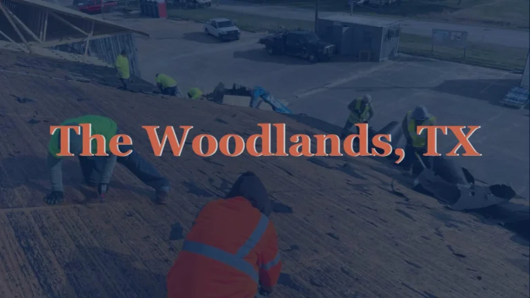 This image shows roofers removing asphalt shingles from a home in The Woodlands, TX, as part of a complete roofing service.