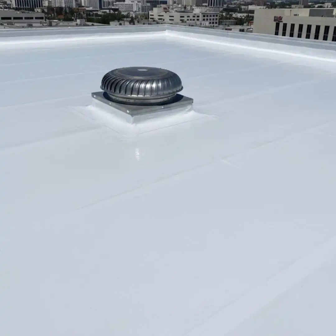 Newly replaced commercial flat roof membrane and vent installation by Achilles Roofing & Exterior