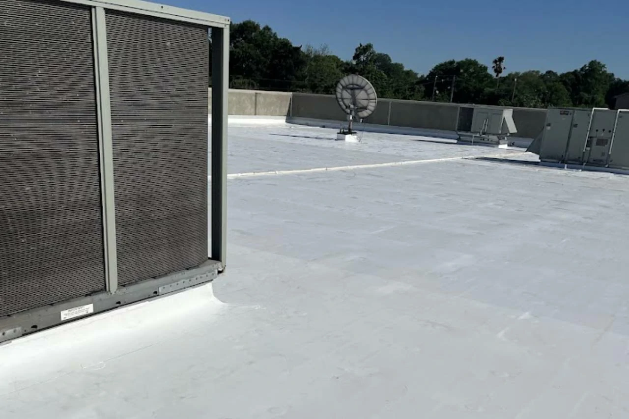 Completed commercial roof waterproofing installation on a flat commercial building by Achilles Roofing & Exterior