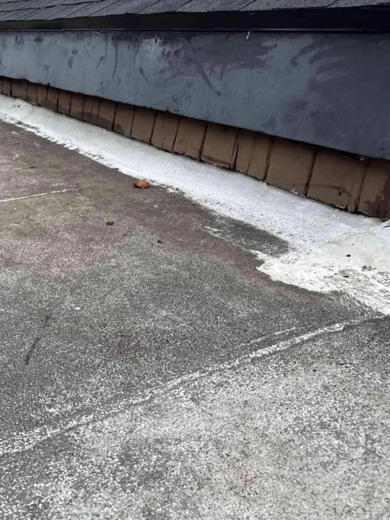 This image shows a Houston, TX house with siding that clearly needs flashing, and a roof needing repair — the siding looks weathered and unprotected at the joints.