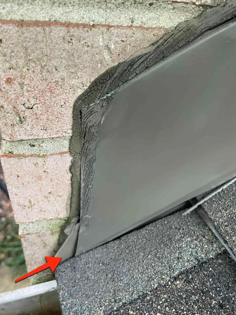 This image shows a roof vent on a Pearland, TX home before the full roof system tear-off and rebuild — the vent is unsealed and the roof shows signs of wear.