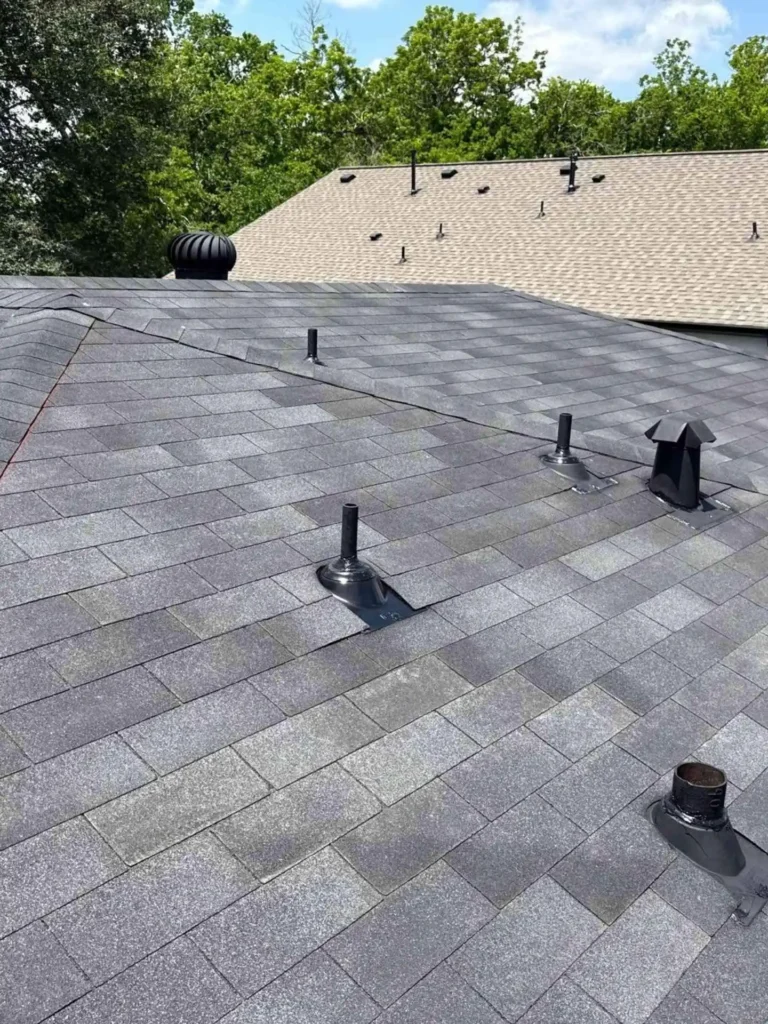 freshly replaced roof shingles with upgraded vents, Houston TX residence exterior