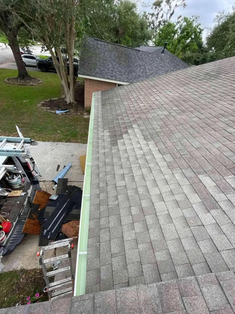 This image displays the final look of the roof repair project in Houston, TX — a strong, uniform roof that enhances curb appeal and protection.