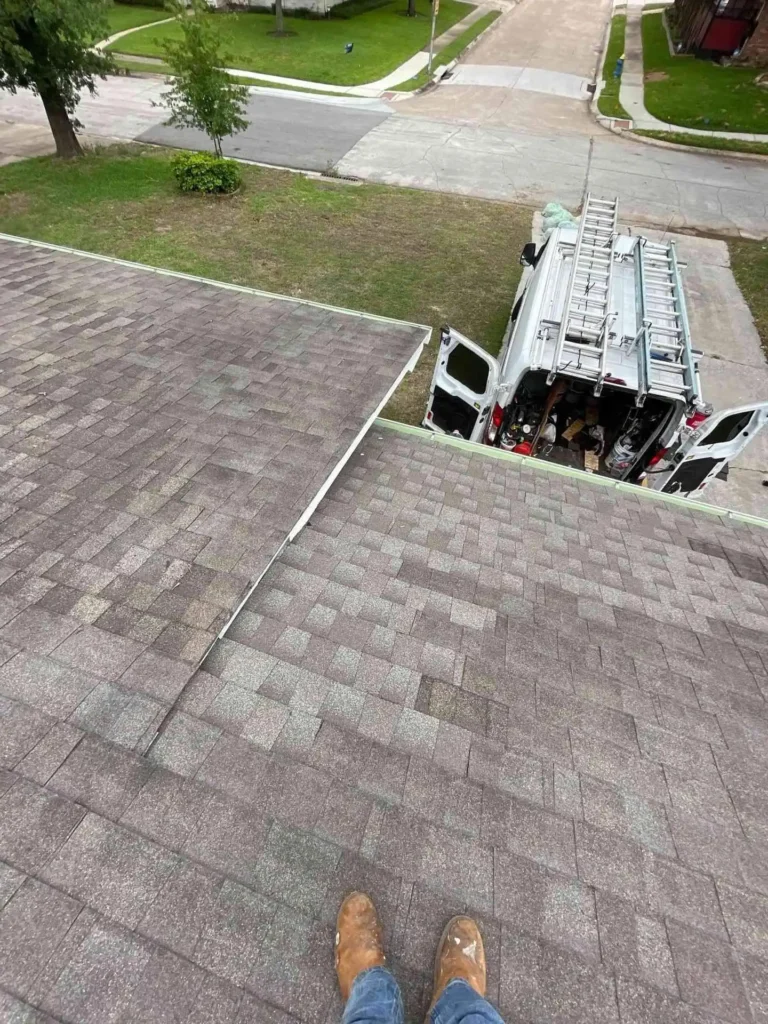 This image shows the final result of a Roof Repair completed on a Houston, TX residence — new shingles neatly aligned with clean roof edges and no visible damage remaining.