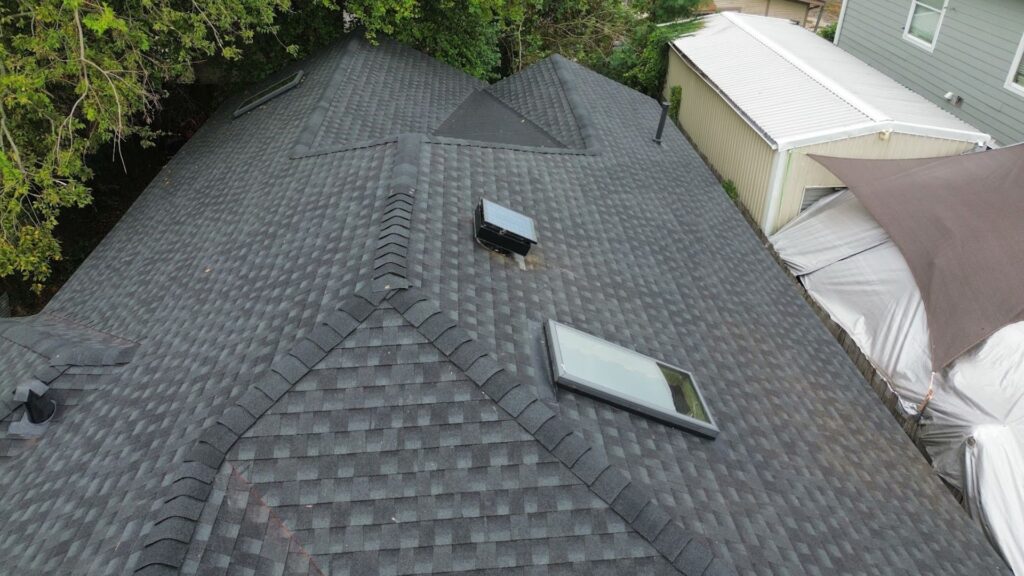 Best Roof Replacement. This technical shot emphasizes precision. By focusing on difficult areas like flashing, we show potential customers that the best roof replacement involves thoroughness, ensuring no detail is overlooked to prevent future leaks.
