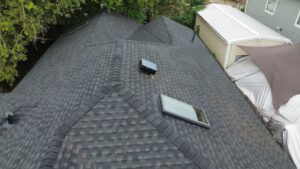 Best Roof Replacement. This technical shot emphasizes precision. By focusing on difficult areas like flashing, we show potential customers that the best roof replacement involves thoroughness, ensuring no detail is overlooked to prevent future leaks.