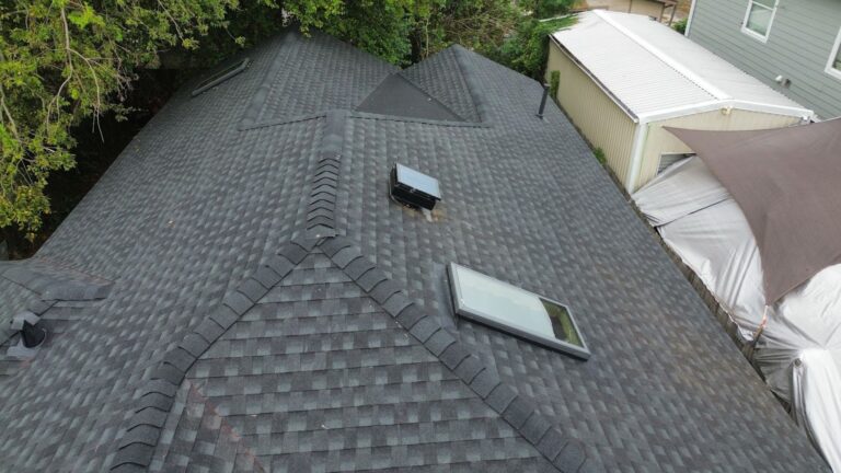 Best Roof Replacement. This technical shot emphasizes precision. By focusing on difficult areas like flashing, we show potential customers that the best roof replacement involves thoroughness, ensuring no detail is overlooked to prevent future leaks.