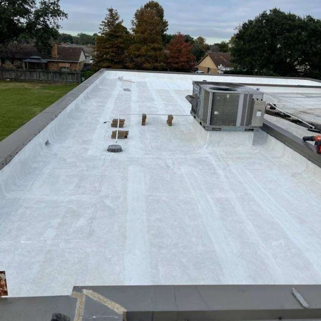 Commercial PVC roofing membrane installed on a commercial flat roof deck by Achilles Roofing & Exterior