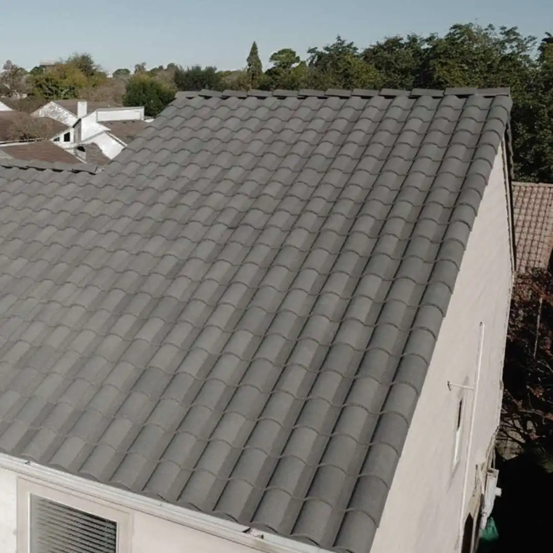 This image highlights a fully installed concrete tile roofing system designed for durability and weather resistance.