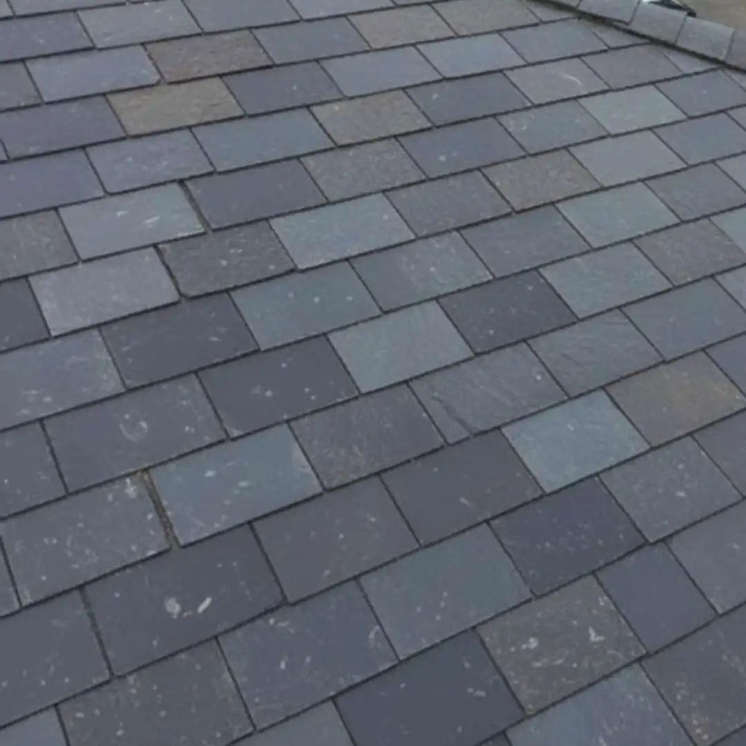 Installed slate roofing tiles engineered for durability and weather resistance by Achilles Roofing & Exterior