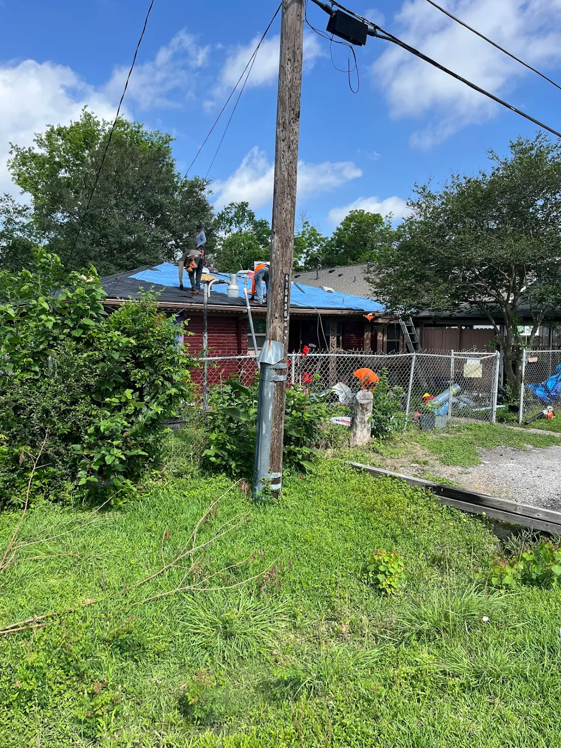 Finished residential roof replacement in Houston, TX, completed by Achilles Roofing Houston with a 5-year workmanship warranty.