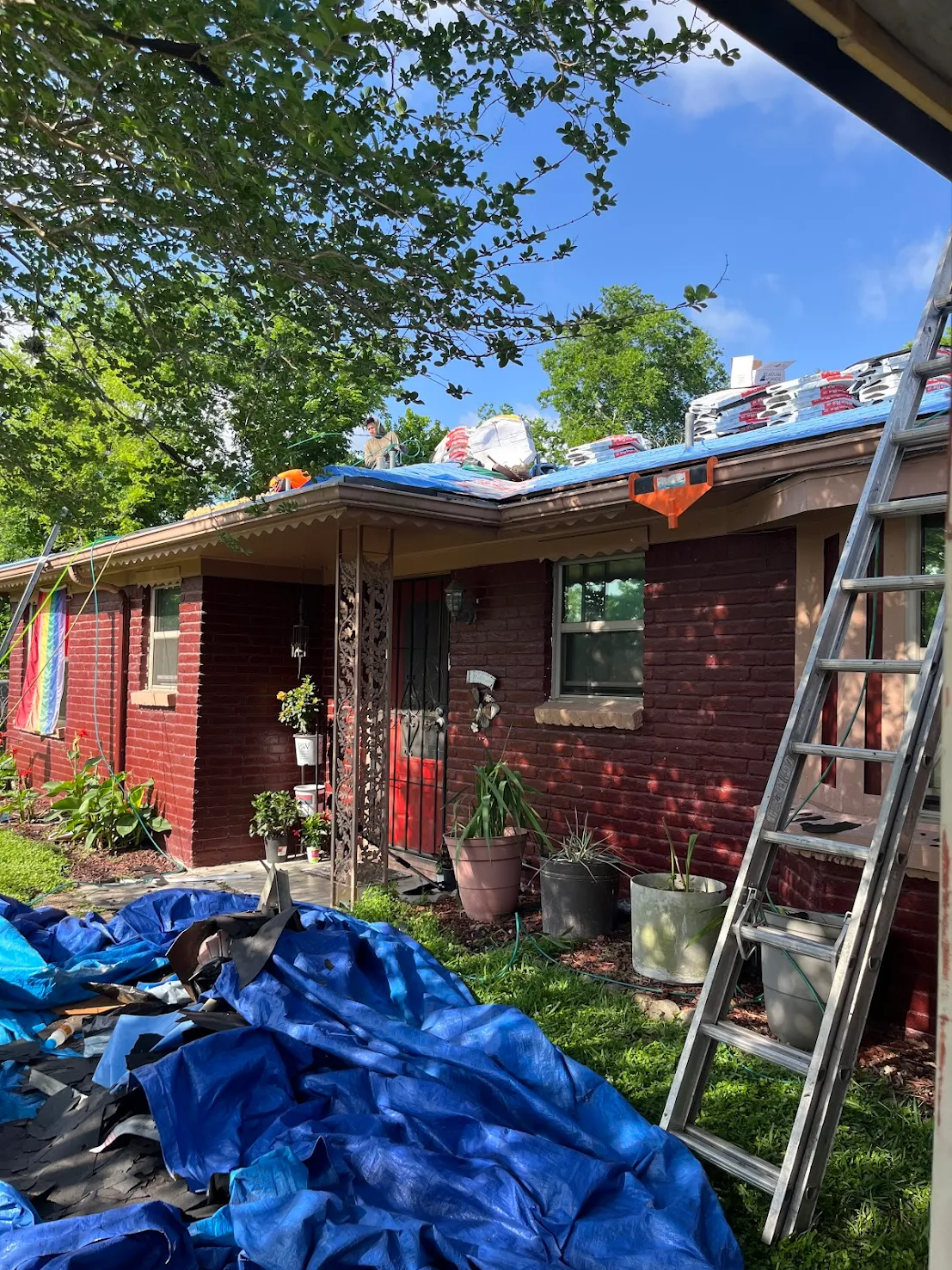 Organized roofing site in Houston showcasing the speed and efficiency of the Achilles Roofing team.